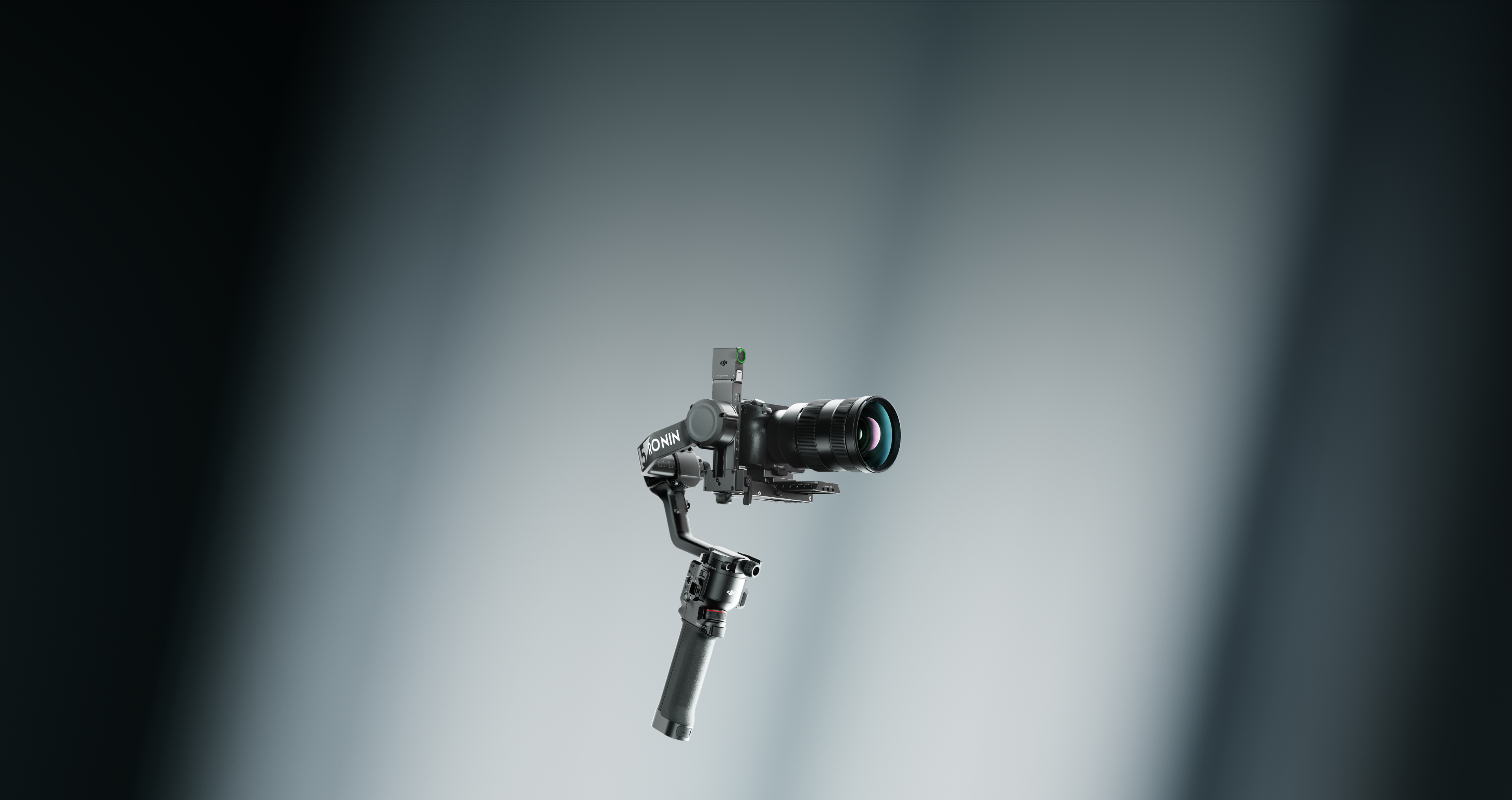 DJI RS 5 supporting a mirrorless camera and zoom lens
