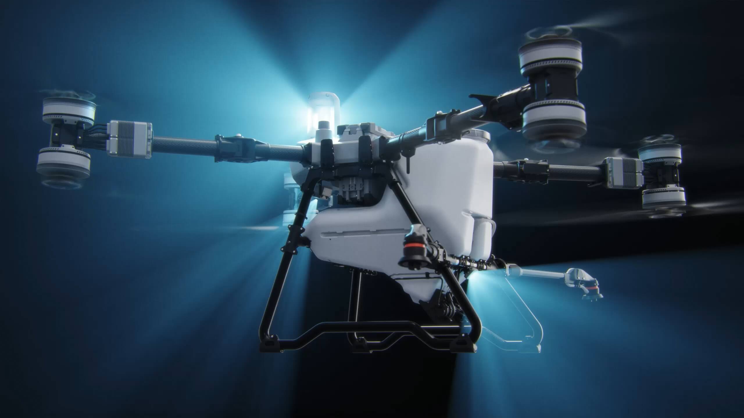 DJI Agras T100 mezőgazdasági drón munka közben (2560x1440)