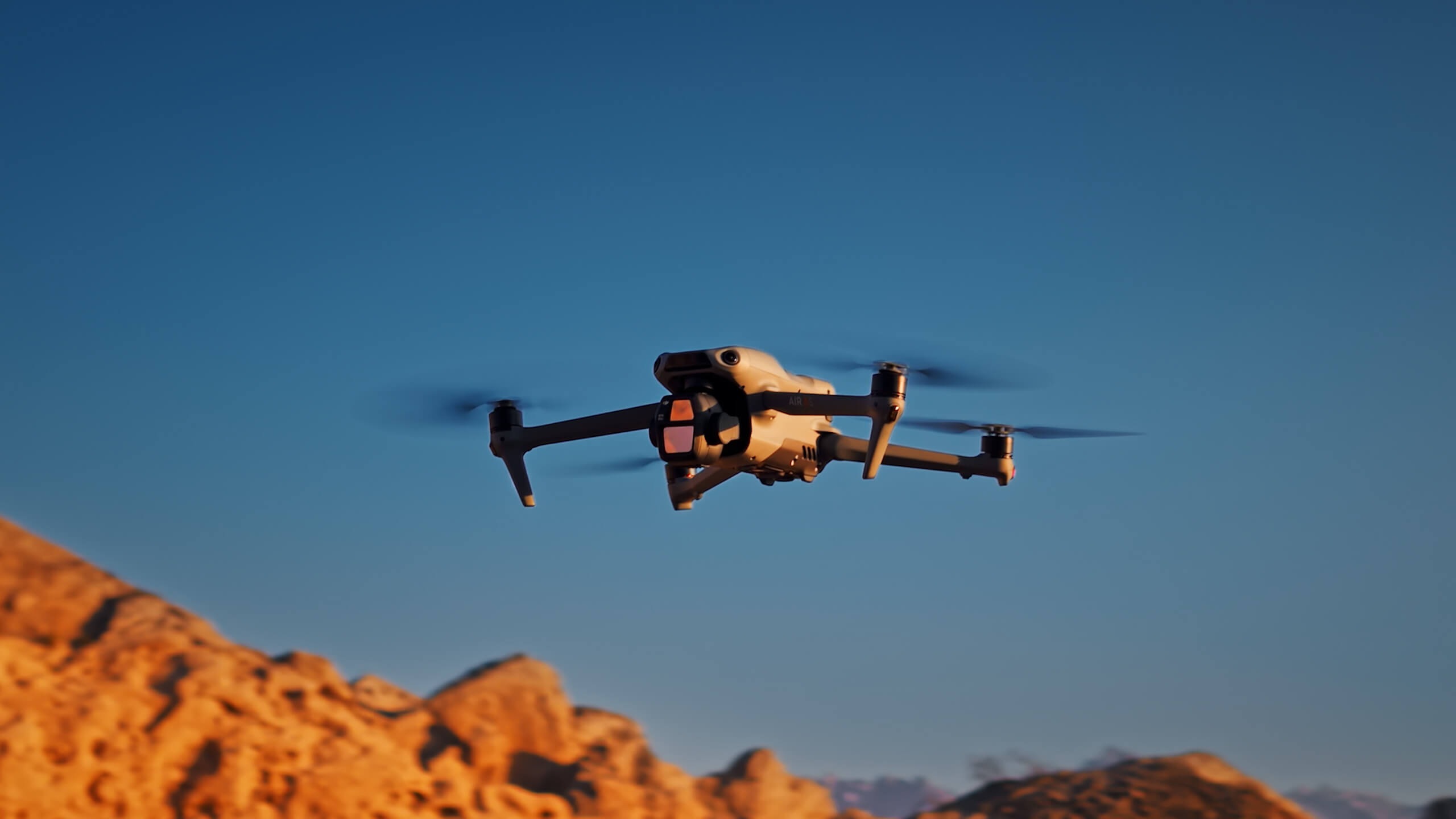 DJI Air 3S flying over a landscape