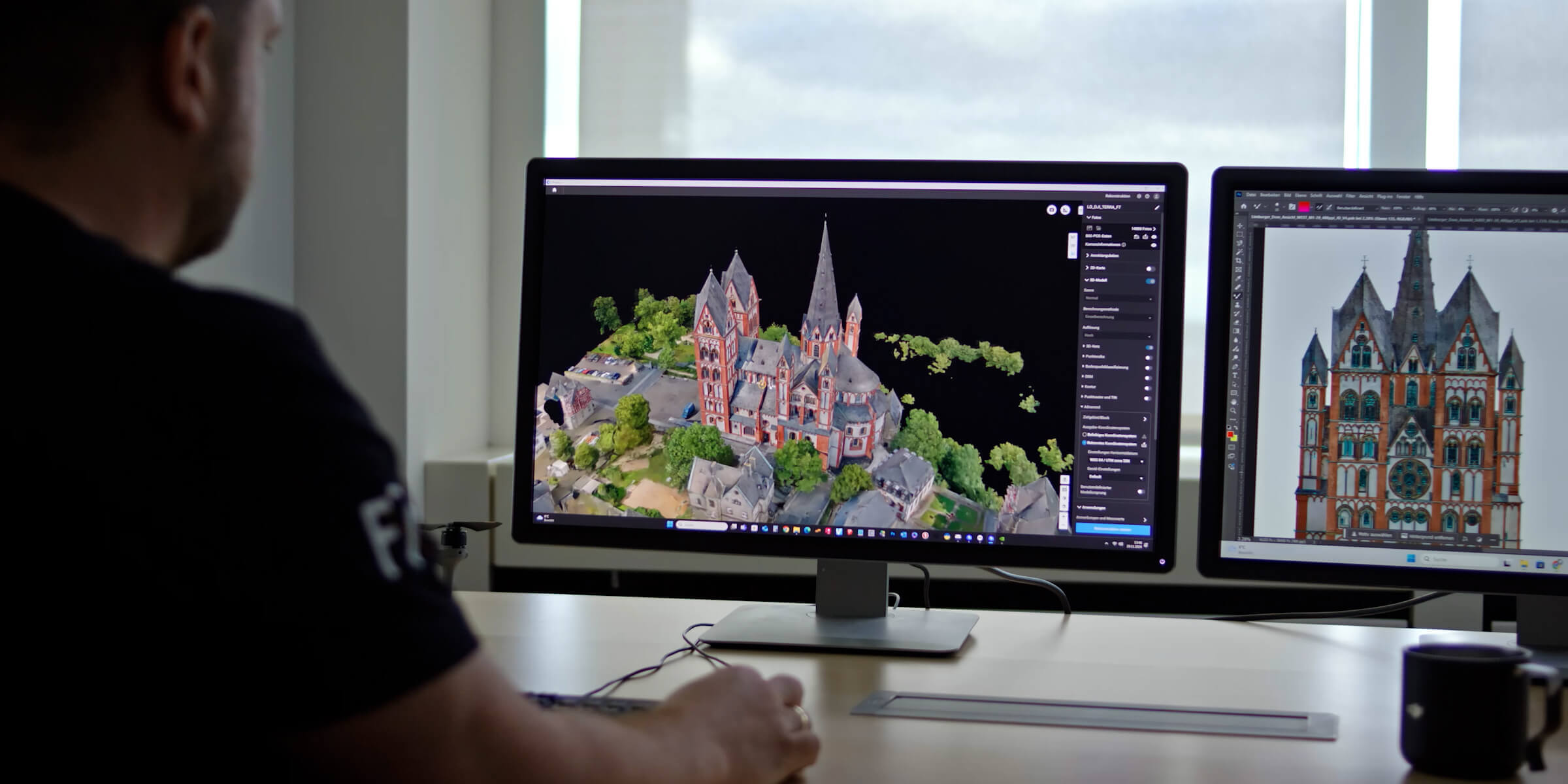 Operator viewing a reconstructed building model on two monitors in DJI promotional photography