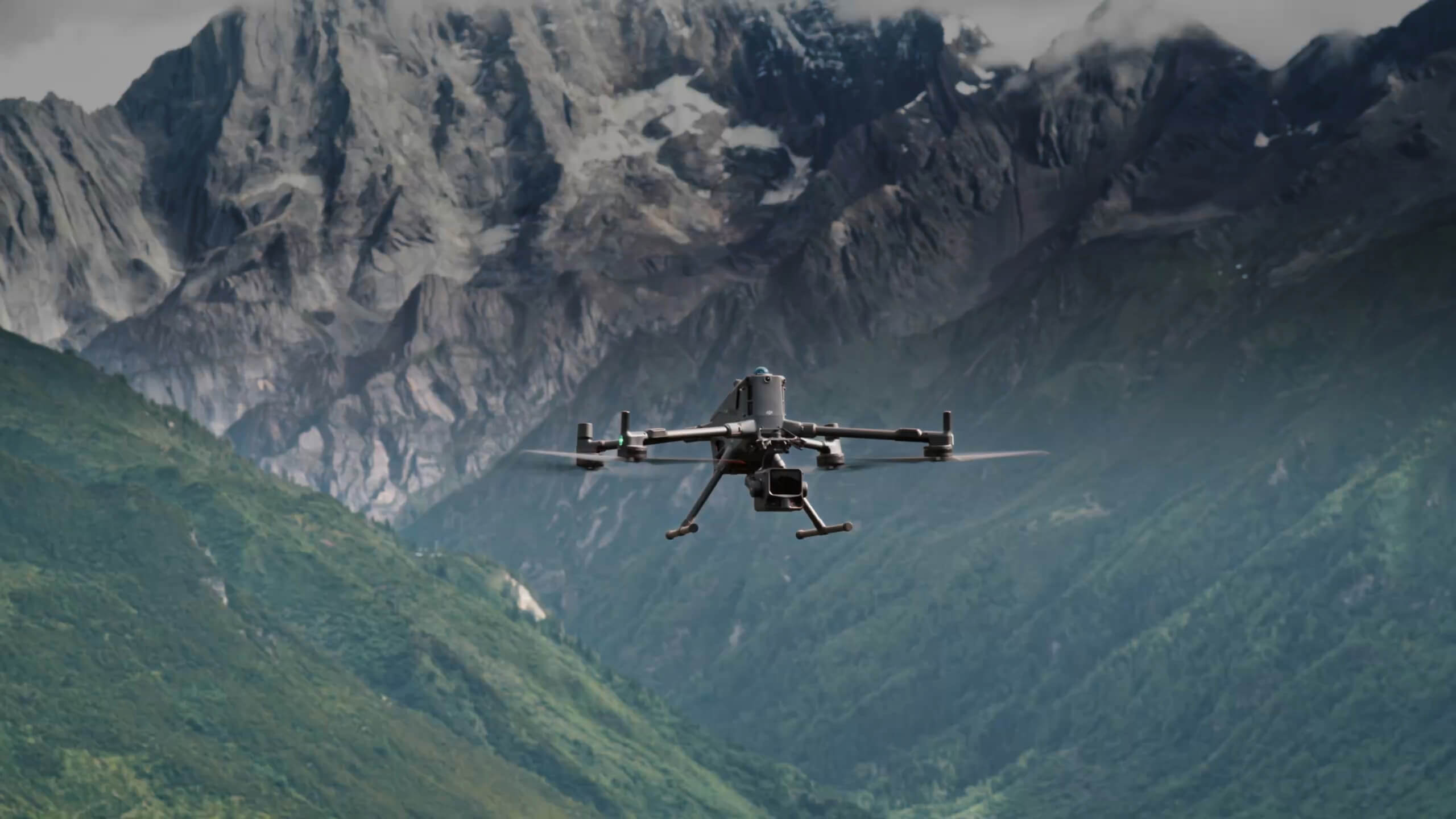 DJI enterprise aircraft flying over forested terrain