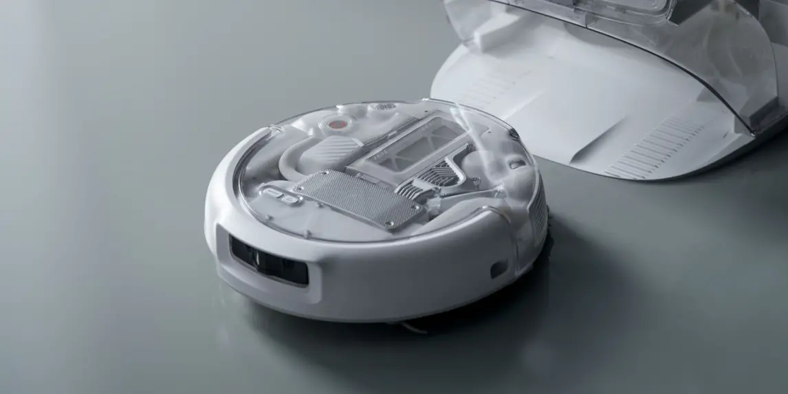 Ramię mopujące DJI ROMO 2 sięga pod krawędź mebla